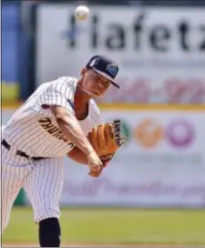  ?? KYLE FRANKO — TRENTONIAN PHOTO ?? Thunder pitcher Albert Abreu throws the ball to the plate against Binghamton during Sunday afternoon’s game.