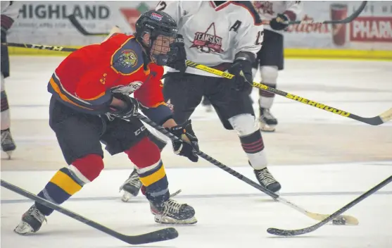  ?? JEREMY FRASER • CAPE BRETON POST ?? Wynston Iserhoff of the Team Eastern Door and North prepares to take a shot on goal during Day 1 of the National Aboriginal Hockey Championsh­ip at the Membertou Sport and Wellness Centre on Monday. Iserhoff is a Cape Breton Eagles prospect and will be the team captain for the Quebec-based Eastern Door and North club this week at the tournament.