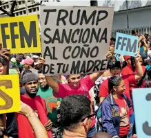  ?? CRISTIAN HERNANDEZ/AFP ?? Simpatizan­tes al régimen de Maduro protestan contra las sanciones de EU