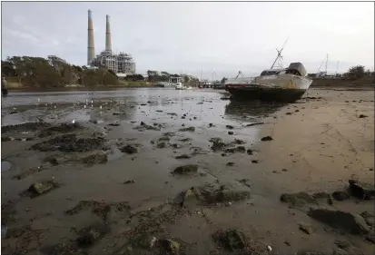  ?? MONTEREY HERALD ARCHIVE ?? The Moss Landing Harbor during the low tide during king tides in 2014.