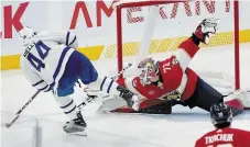  ?? MARTA LAVANDIER THE ASSOCIATED PRESS FILE PHOTO ?? Florida
Panthers goaltender Sergei Bobrovsky saves a shot on goal by Toronto Maple Leafs defenceman Morgan Rielly during NHL action in October. Bobrovsky will be a key ingredient to any Panthers playoff success, writes Chris Hardill.