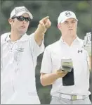  ?? Jay LaPrete
Associated Press ?? JORDAN SPIETH, right, the lone golfer with a shot at a Grand Slam this year, with caddie Michael Greller.