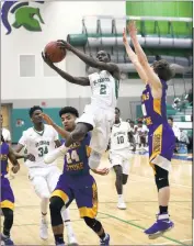  ?? PHOTO BY CHRIS THUMM ?? Cameron Sullivan of St. Charles goes up a layup in Friday night’s 62-46 win over visiting Thomas Stone in a SMAC Potomac Division contest. Sullivan finished with nine points in the game.