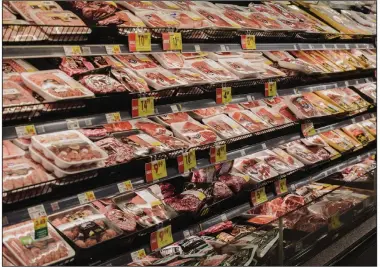  ??  ?? Meat is displayed for sale at Kroger Marketplac­e in Versailles, Ky., in November. (Bloomberg (WPNS)/Scotty Perry)