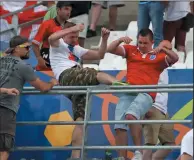  ?? AP PHOTO/THANASSIS STAVRAKIS, FILE ?? In this file photo taken on June 11, 2016, clashes break out in the stands during the Euro 2016 Group B soccer match between England and Russia, at the Velodrome stadium in Marseille, France.