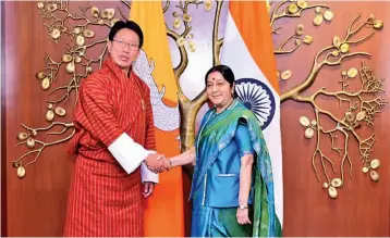  ??  ?? External affairs minister Sushma Swaraj with Bhutan’s foreign affairs minister Lyonpo Damcho Dorji