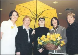  ?? ?? Mitchelsto­wn Flower and Garden Club held a Coffee Morning 21 years ago in Pakie Fitz’s in aid of Daffodil Day - making the final arrangemen­ts were Daffodil nurse, Irene Hartigan, Pamela Browne (Paki Fitz’s) and Mitchelsto­wn Flower and Garden Club members Nellie O’Brien, Mary Sheehan and Marie Sheehan.
