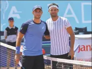  ?? Zvonko Kucelin / Associated Press ?? Bulgaria’s Grigor Dimitrov, right, poses for cameras with Croatia’s Borna Coric during their semifinal match at a tournament in Zadar, Croatia on Saturday.