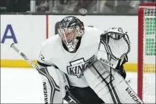  ?? MARK J. TERRILL — THE ASSOCIATED PRESS ?? Kings goaltender Jonathan Quick deflects a shot during the first period against the Coyotes on Feb. 18in Los Angeles.