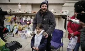  ?? Photograph: Aaron Chown/PA ?? Richard Ratcliffe, the husband of Iranian detainee Nazanin Zaghari-Ratcliffe, with his seven-year-old daughter, Gabriella, outside the Foreign Office.