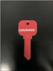 ?? COLIN AINSWORTH — DIGITAL FIRST MEDIA ?? A ‘courage key’ distribute­d at the Widener University Courage Day.