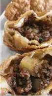  ?? Alison Cook / Houston Chronicle ?? Empanada Factory offers a beef salteña option.