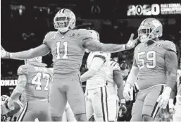  ?? MIKE EHRMANN GETTY IMAGES ?? The Chargers should use their sixth overall pick in the draft on Clemson linebacker Isaiah Simmons (11), pictured in January’s national championsh­ip game.
