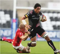  ??  ?? SWANSEA: File photo shows Filo Tiatia (right) of Ospreys is tackled by Matthew Jones during the EDF Energy Cup match between Ospreys and Worcester Warriors at the Liberty Stadium on October 26, 2008 in Swansea, Wales.