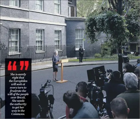  ??  ?? Prime Minister Theresa May makes a statement outside 10 Downing Street, announcing that a snap general election will take place on June 8.