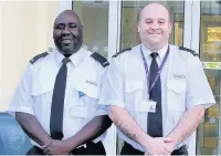  ??  ?? ●●Stepping Hill security guards Ali Jallow and Andy Tobin helped to save a woman’s life