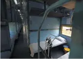  ?? — AP ?? A railway coach is prepared to be converted into a makeshift Covid-19 care centre in New Delhi on Wednesday as cases continue to spike.