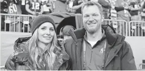 ?? MARK J. REBILAS/USA TODAY SPORTS ?? Retired NASCAR driver Dale Earnhardt Jr. and wife Amy Reimann attended the Super Bowl in Minneapoli­s on Sunday.