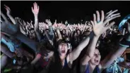 ??  ?? In this file photo, fans cheer during the EXIT festival in Novi Sad.