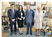  ??  ?? Parental guidance: Clarke Gayford, main, has received tips on fatherhood from the Royal family; with partner Jacinda Ardern, below, and the couple with Prince Charles and the Duchess of Cornwall, above