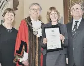  ??  ?? Chris Ash, Gillian Beasley and Coun Peter Hiller with Lifetime Achievemen­t winner Karen Hepworth-Lavery