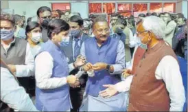  ?? SANTOSH KUMAR/HT ?? Chief minister Nitish Kumar meets newly-elected minister Syed Shahnawaz Hussain after the oath ceremony at the Raj Bhawan in Patna on Tuesday.
