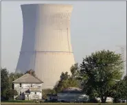  ?? ASSOCIATED PRESS FILE ?? The cooling tower of the Davis-Besse Nuclear Power Station in Oak Harbor is shown.