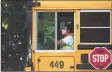  ??  ?? Tyler Sizemore / Hearst Conn. Media file photo
A bus driver wears a mask while driving Westover Elementary students on Sept. 8, 2020.