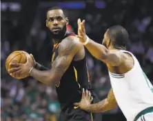  ?? Charles Krupa / Associated Press ?? Boston’s Marcus Morris guards LeBron James in Game 5, when the 33-year-old Cleveland forward showed unusual fatigue.