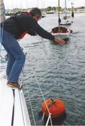  ??  ?? Unweighted rope can make lassoing a mooring buoy a frustratin­g experience