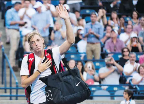  ?? PHOTOS: NATHAN DENETTE/THE CANADIAN PRESS ?? Denis Shapovalov waves to the crowd after the Canadian was defeated in quick fashion 7-5, 6-2 by Robin Haase of the Netherland­s on Thursday night in the third round of the Rogers Cup at the Aviva Centre in Toronto.