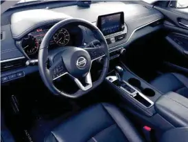 ?? STAFF PHOTO BY MARK KENNEDY ?? The “sport” interior of the 2019 Nissan Altima includes leather seat covers with color stitching.