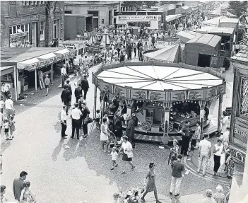  ??  ?? The fun of the fair at Lammas Market, 1969.