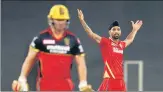  ?? BCCI ?? PK’S Harpreet Brar (R) returned figures of 3/19 bagging the prized scalps of Virat Kohli, Glenn Maxwell and AB de Villiers.