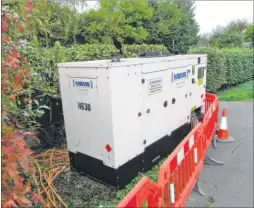  ??  ?? Generators in Farm Lane, Little Burton, above, and in the car park behind the Faversham Road shops, left, were brought in to help ease the misery for residents in Kennington, as workers battled to power permanentl­y