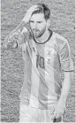  ?? Don Emmert / AFP/Getty Images ?? Lionel Messi was dismayed after a loss to Chile in which he failed in the penalty-kick shootout.