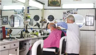  ?? (Marc Israel Sellem/The Jerusalem Post) ?? A BARBER shop is seen in Jerusalem yesterday.