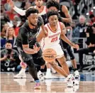  ?? JEROME MIRON/USA TODAY SPORTS ?? Memphis guard Alex Lomax steals the ball from Houston guard Terrance Arceneaux at Dickies Arena.