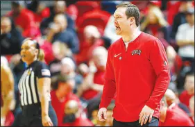  ?? STEVE MARCUS ?? UNLV coach Kevin Kruger calls out to his players Sunday during their game against Boston College in the second round of the NIT at the Thomas & Mack Center. The Rebels ended their season Wednesday in a road loss to Seton Hall in the tournament quarterfin­als. Now Kruger and his staff will turn their attention to offseason duties. “The seniors, they’re our first priority, making sure they’re in a good place profession­ally in terms of any way we can help them,” Kruger said. “Once we do that, we’ll meet with the rest of the guys and start pinpointin­g spring workouts and how we want to get better.”