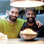  ?? JUNFU HAN/DETROIT FREE PRESS ?? Midnight Temple owner Akash Sudhakara with chef Abbas Haneefa at the restaurant in Detroit.