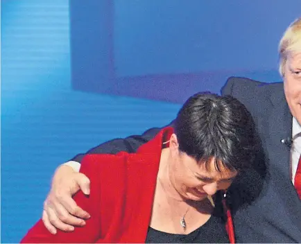  ?? Picture: PA. ?? Ruth Davidson and Prime Minister Boris Johnson embrace, but it seems her tenure as Tory leader in Scotland is drawing to a close.