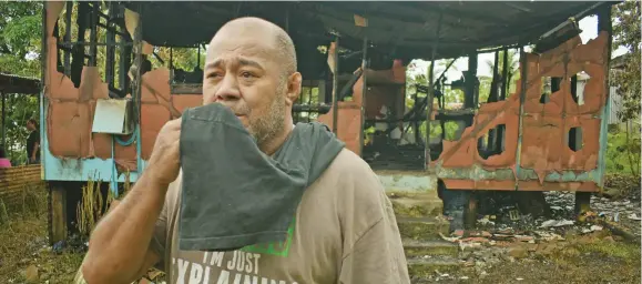  ?? Photo: RonaldKuma­r ?? Lemeki Matabogi outside his burnt home in Kalokalo Crescent, Makoi on October 20, 2020.