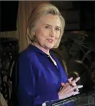  ?? BEBETO MATTHEWS — THE ASSOCIATED PRESS ?? Hillary Clinton delivers the keynote address at the 8th Annual Elly Award luncheon, after being one three women receiving this year’s award on Monday in New York. Clinton on Monday called the Trump administra­tion’s “zero tolerance” policy that has...