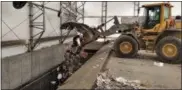  ?? FRAN MAYE - MEDIANEWS GROUP ?? Heavy machinery is used to move recycling into a huge container at the Southeaste­rn Chester County Recycling Authority outside of West Grove.