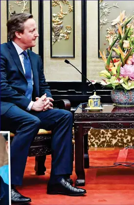  ??  ?? FUND TALKS: President Xi Jinping and David Cameron in January 2018 discuss a ‘Golden Era’ of relations between Britain and China