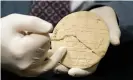 ??  ?? The ancient clay tablet was engraved with a stylus to describe a field containing marshy areas, as well as a threshing floor and nearby tower. Photograph: UNSW