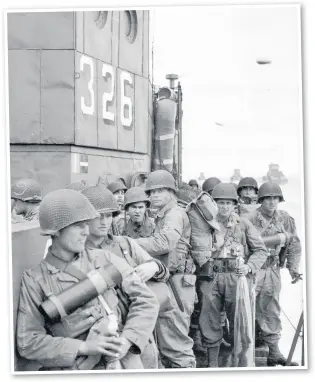  ?? Picture: National Archives ?? Troops aboard LCI(L) 326 from South Wales-based 359th Infantry Regiment at 6.10 hrs on D-Day morning moving in on Utah Beach.