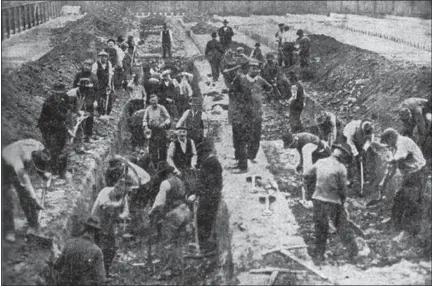  ?? COURTESY WEST ROCKHILL HISTORICAL SOCIETY ?? Philadelph­ia men dig a mass grave during the 1918Spanis­h Influenza pandemic. The photo shown in Michael Jesberger’s presentati­on is from The Historical Medical Library of The College of Physicians of Philadelph­ia.