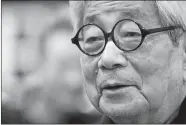  ?? JACQUES BRINON/AP FILE PHOTO ?? Japanese Nobel Prize-winning author Kenzaburo Oe poses during the inaugurati­on of the 32nd Paris Book Fair, which focused on Japanese writers, March 15, 2012. Japanese publisher Kodansha Ltd. said that Oe has died. He was 88.