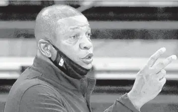  ?? ELIZABETH ROBERTSON |TNS ?? Philadelph­ia coach Doc Rivers has his own thoughts on the NBA’s roster rules.
